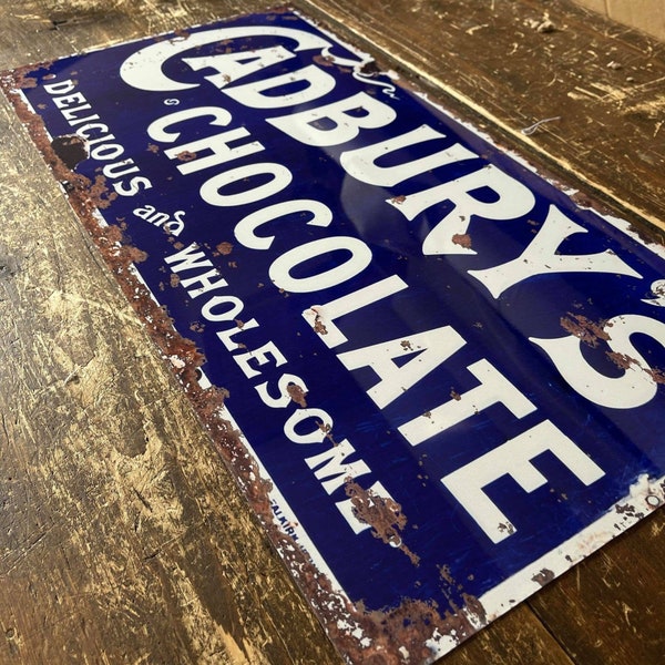 Cadburys chocolate purple metal tin sign