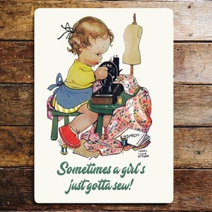 Young girl sewing machine vintage metal sign plaque