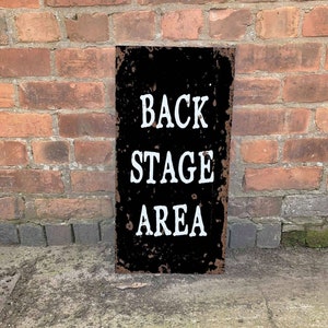 Back stage area - metal advertising wall sign