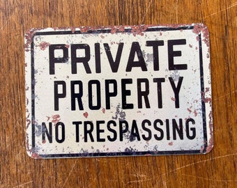 Private property no trespassing  - metal sign plaque