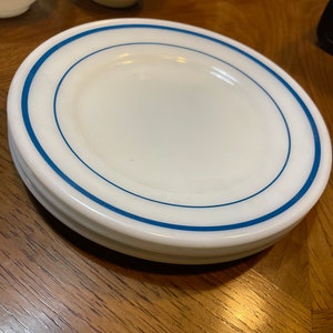 Vintage Pyrex bread plates.