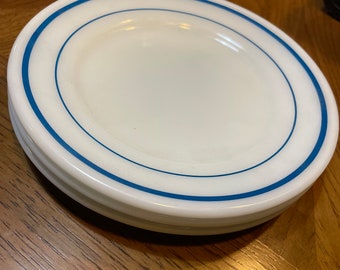 Vintage Pyrex bread plates.