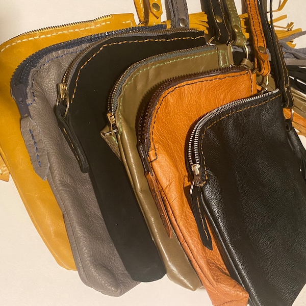 Bag, purse, wristlet, leather, suede, phone pocket, eyeglass carrier, soft and lightweight. Varied colours.