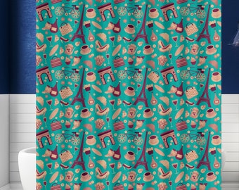 May include: Teal shower curtain with a repeating pattern of Parisian icons. The design includes the Eiffel Tower, Arc de Triomphe, bicycles, wine bottles, coffee cups, and pastries in shades of burgundy, beige, and brown.