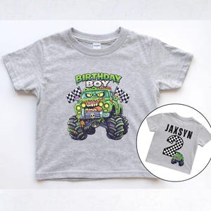 May include: A grey short-sleeved t-shirt with a green monster truck graphic and the words "BIRTHDAY BOY". A smaller image shows a grey shirt with the name "JAXSYN" and the number "2".