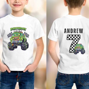 May include: White t-shirt with a green monster truck design and the words "BIRTHDAY BOY" and chequered flags. The back shows the name "ANDREW" above a chequered number 7 and a smaller monster truck graphic.