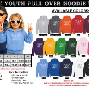 May include: Youth pull-over hoodies in various colours, featuring a butterfly design. Available colours include sport grey, dark heather, orange, red, maroon, purple, gold, green, forest, pink, heliconia, blue, royal, navy, white, and black. Widths range from 40.59 to 51.00 cm.