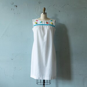 Vintage 60s white cotton shift dress w/ embroidered rainbow flowers & rick rack details