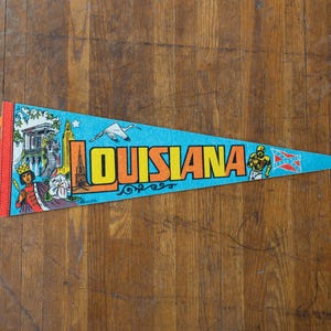 vintage Louisiana State souvenir pennant flag - iconic Louisiana figures / motifs