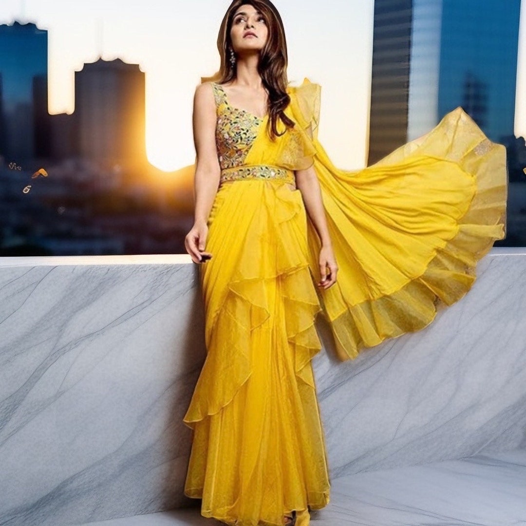 Georgette Designer Ruffle Saree with Handwoven Tribal Work