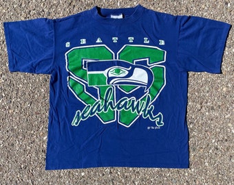 Vtg 1990s Seattle Seahawks NFL Football The Game T-Shirt Men's Size (L) / Single Stitch / 90s Team Apparel / Vtg Sports Tee / Graphic Tee