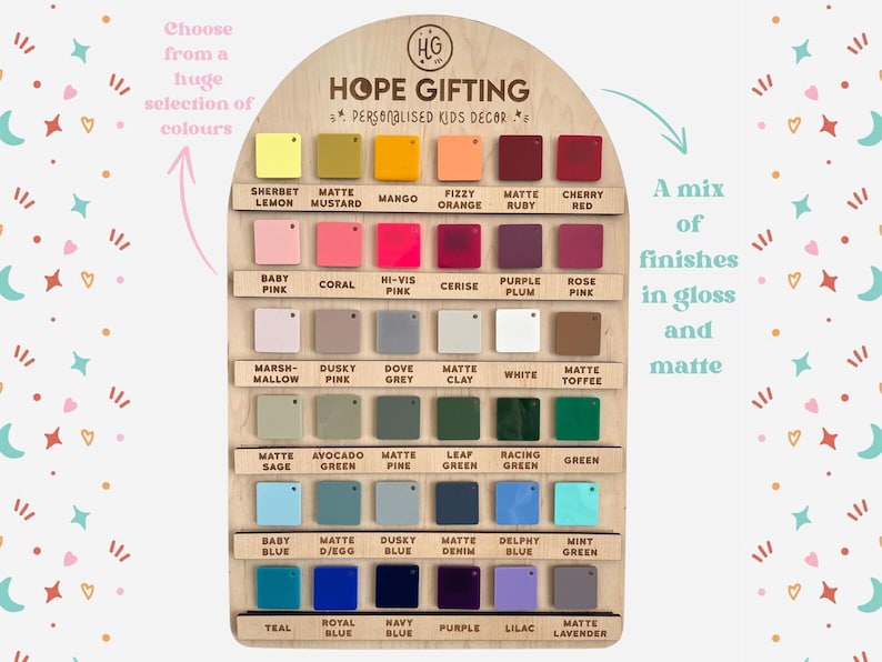 May include: Wooden display board featuring a wide array of color swatches in gloss and matte finishes. The board is labeled "HOPE GIFTING" and "PERSONALISED KIDS DECOR". Colors include Sherbet Lemon, Baby Pink, and Teal.