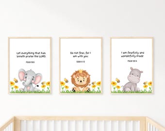 May include: Three framed nursery art prints featuring watercolor illustrations of an elephant, lion, and hippo. Each print has a Bible verse and is surrounded by flowers and bees. The prints are in a light wood frame.