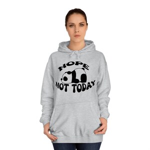 May include: A gray hooded sweatshirt with a black graphic of a panda bear lying down with the text "HOPE NOT TODAY" in a black, stylized font.
