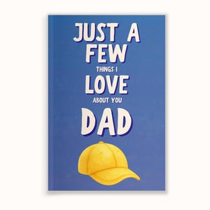 May include: A blue card with the text "JUST A FEW THINGS I LOVE ABOUT YOU DAD" in white. A yellow baseball cap graphic is at the bottom. The card is a Father's Day or birthday gift.