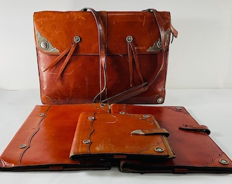 Maletín vintage Charles Underwood de piel de vaca italiana con conchos chapados en plata esterlina, organizador de agenda.