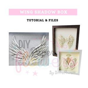 May include: Three shadow boxes with angel wing designs. One box features white wings on a gray background, another has cream-colored wings in a dark frame, and the third displays pink and cream wings with a halo.