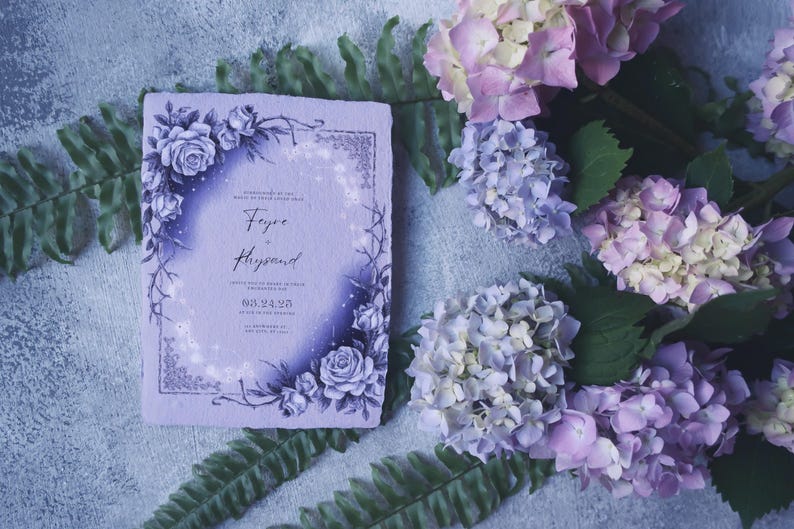 May include: A purple wedding invitation with a floral design and the text "Faye & Hyland" and the date "09.22.23".