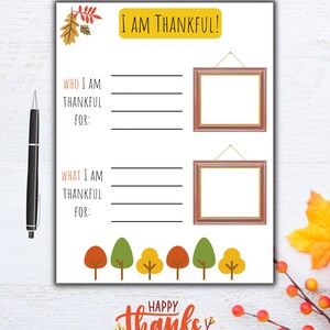 May include: Printable Thanksgiving activity sheet with the text "I am thankful!" and two blank frames for writing. The sheet also includes a row of colorful trees and the text "Happy Thanksgiving".