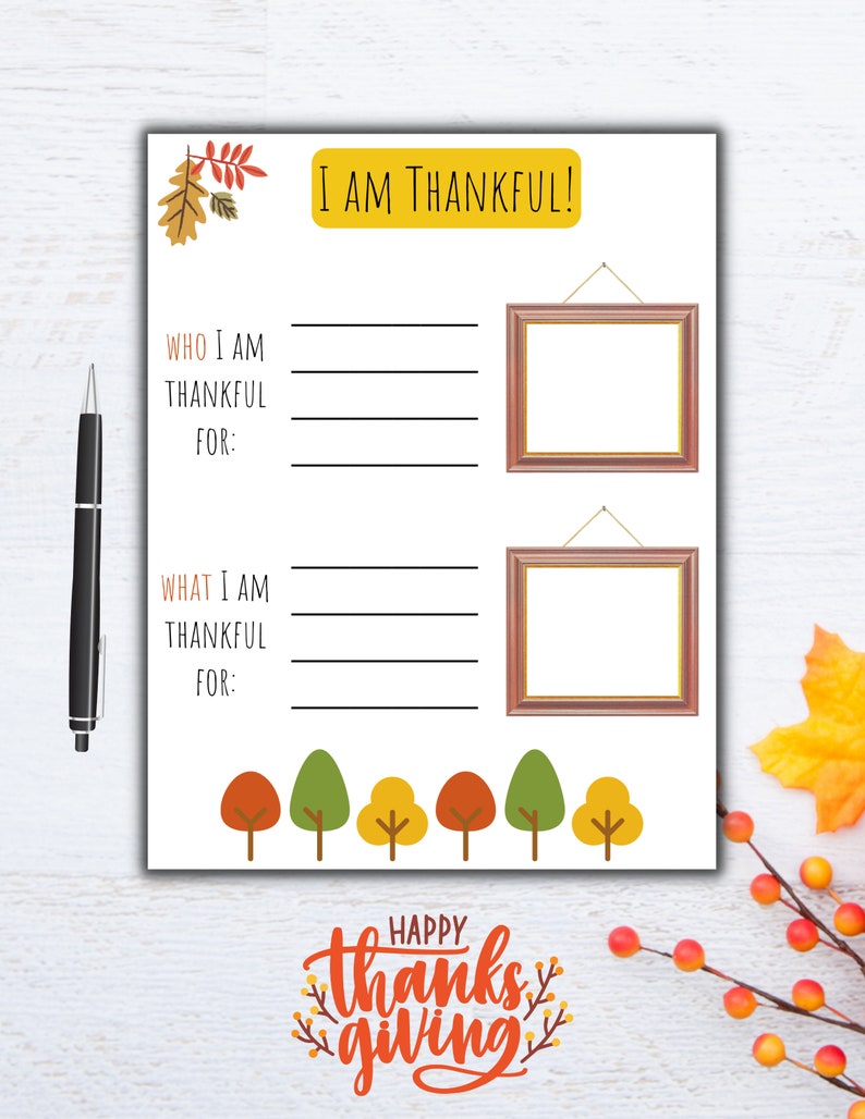 May include: Printable Thanksgiving activity sheet with the text "I am thankful!" and two blank frames for writing. The sheet also includes a row of colorful trees and the text "Happy Thanksgiving".