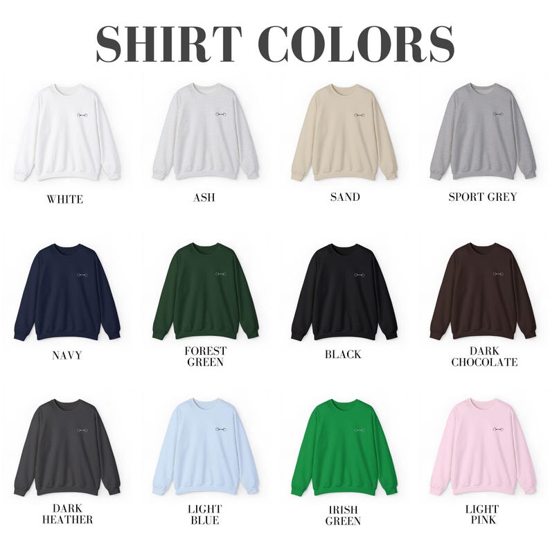 May include: A chart showing 12 different sweatshirt colors, including white, ash, sand, sport grey, navy, forest green, black, dark chocolate, dark heather, light blue, Irish green, and light pink.