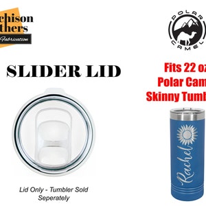 May include: A clear plastic slider lid for a 22 ounce Polar Camel skinny tumbler. The lid has a sliding opening for easy access to drinks. The text "Slider Lid" is written in black letters on a white background. The text "Lid Only - Tumbler Sold Seperately" is written in black letters on a white background.