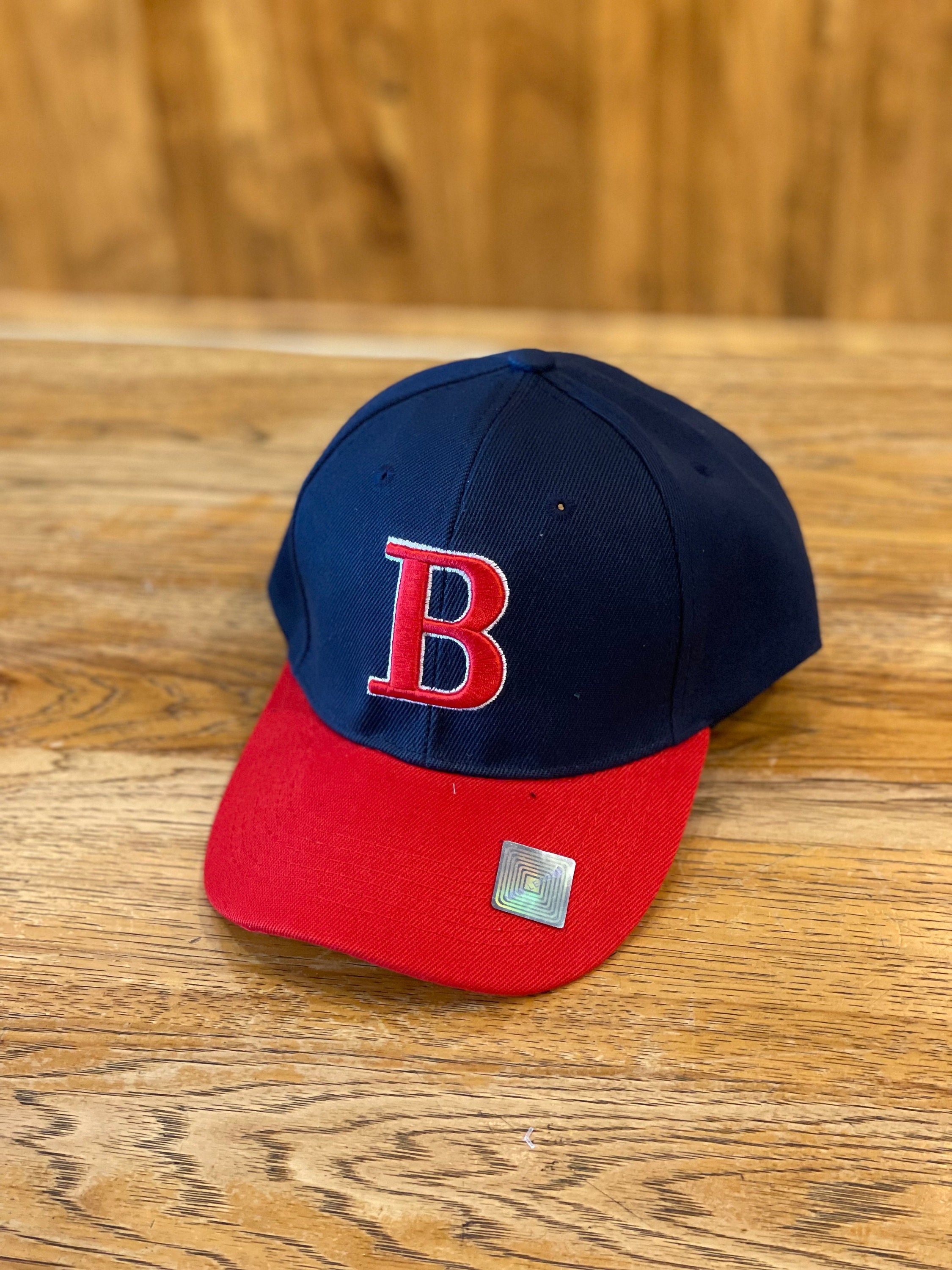Trade Winds Casquette de police noire avec lettres blanches brodées