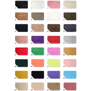 May include: A color chart of 32 fabric swatches. The swatches are arranged in four rows of eight. Each swatch is numbered from 1 to 32. The swatches are a variety of colors, including black, white, pink, brown, red, green, yellow, orange, purple, and blue.