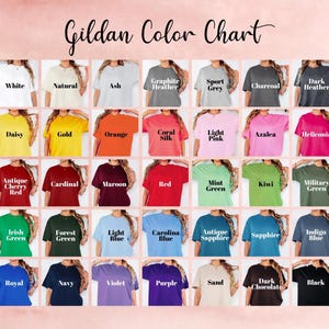 May include: A color chart titled "Gildan Color Chart" displays various t-shirt colors, including white, black, and shades of blue, green, and red. The chart showcases a range of hues, from light to dark, with each color labeled.