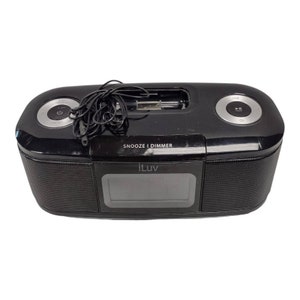 May include: Black iLuv clock radio with a digital display, two speakers, and a 3.5mm audio jack. The radio has a snooze and dimmer button.