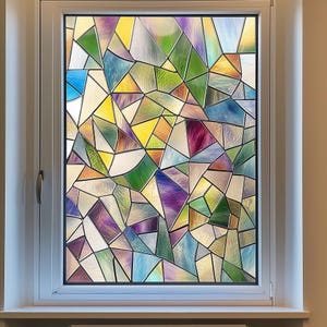 May include: A stained glass window film with a geometric pattern in shades of blue, green, purple, and yellow.