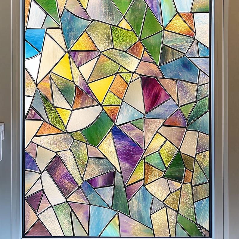 May include: A stained glass window film with a geometric pattern in shades of blue, green, purple, and yellow.