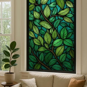 May include: A large rectangular stained glass window with a design of green leaves and branches against a teal background. The window is framed in black and set in a white window frame. The room has a neutral colour palette.