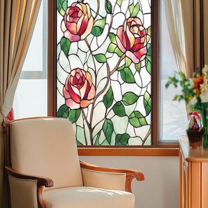 May include: A stained glass window featuring a floral design with three pink roses and green leaves.