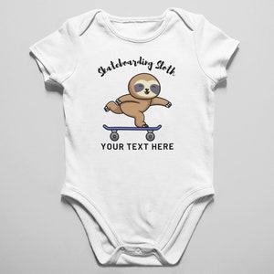 May include: White baby onesie with a cartoon sloth skateboarding. The text "Skateboarding Sloth" is above the sloth and "YOUR TEXT HERE" is below the sloth.