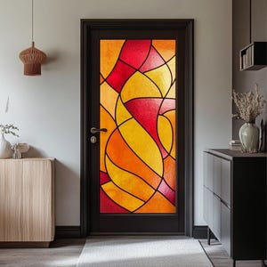 May include: A stained glass door with a geometric design in shades of red, orange, and yellow.