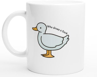 Taza de café con el mensaje "A quién le importa un pato", taza con humor divertido sobre un pato, taza con cita humorística, taza estética sobre un pato, regalo para amantes de los patos, regalos con temática de patos