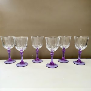 May include: A set of three ceramic nesting bowls in shades of blue, green, and white. The bowls have a speckled glaze and a simple, modern design. The largest bowl is approximately 15 cm in diameter.