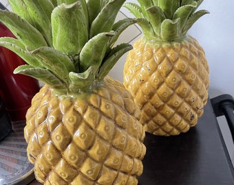 Pair of giant ceramic pineapple candle stick holders