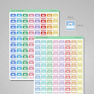 May include: Two sheets of sticker paper with 0.5 inch scale stickers. The stickers are in various colors, including blue, green, pink, purple, red, and yellow. Each sticker features a scale icon with a blank space for writing. The text "IPUT STICKERS" and "WM-001" and "WM-002" are printed on the sheets.