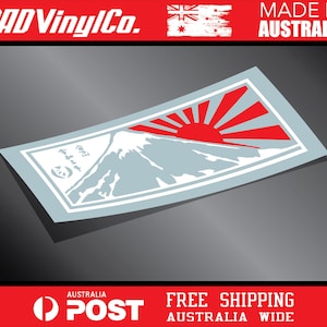 May include: White and red vinyl sticker with a stylized image of Mount Fuji and a rising sun. The sticker has the text "RAD Vinyl Co." and "Made in Australia" on it.