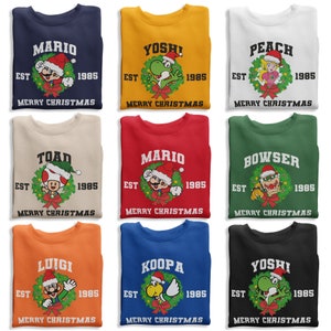 May include: Twelve different Christmas sweaters featuring various characters from the Super Mario Bros. video game franchise. Each sweater has a different character, including Mario, Yoshi, Peach, Toad, Bowser, Luigi, Koopa, and Yoshi. Each sweater is a different color, including red, blue, green, yellow, white, black, orange, and beige. Each sweater has the text "EST 1985" and "Merry Christmas" printed on it.