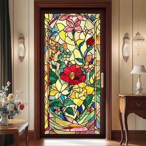 May include: A stained glass window film featuring a colorful floral design with red, yellow, pink, and green flowers. The design is framed by a dark brown border.