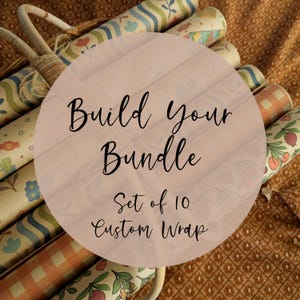 May include: A collection of ten rolls of wrapping paper featuring various patterns including floral, checkered, and wavy designs in muted tones of blue, green, and orange. The text Build Your Bundle Set of 10 Custom Wrap is overlaid in black.