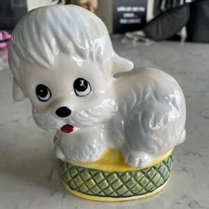 Vintage puppy on cushion figurine