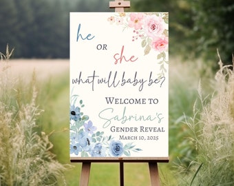 May include: A gender reveal party sign with blue and pink flowers. The sign says "he or she what will baby be?" and "Welcome to Sabrina's Gender Reveal March 10, 2025".