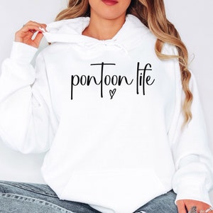 May include: White hooded sweatshirt with the text "pontoon life" in black cursive lettering with a small heart symbol below the text.