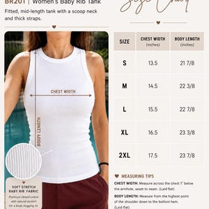 May include: White baby rib tank top with a scoop neck and thick straps. The image includes a size chart with chest width and body length measurements in inches. The tank top is made of soft stretch baby rib fabric.