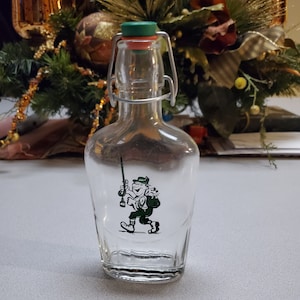 RARE) Glass Flask with Green Sportsman with Dog in Backpack