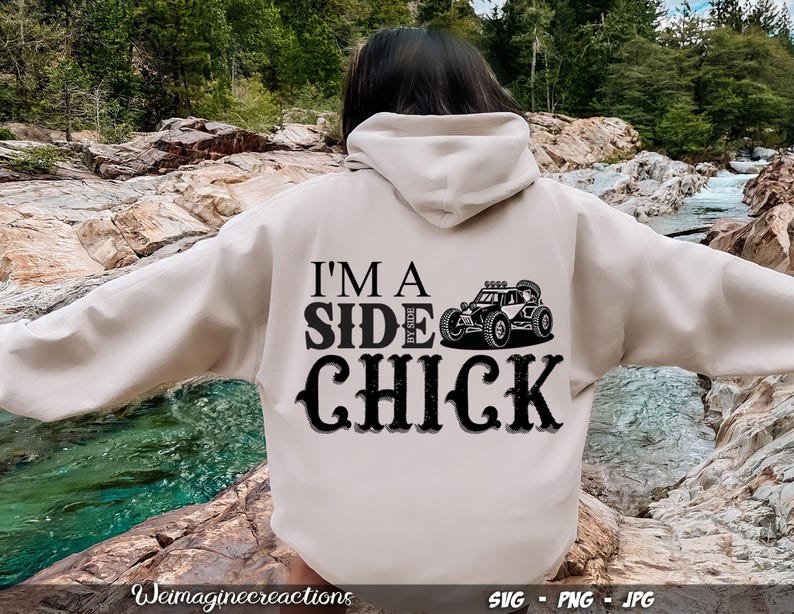 May include: A white hoodie with the text "I'm a Side Chick" in black lettering. A black and white illustration of a side-by-side vehicle is above the text.